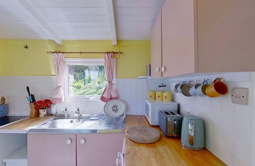 Hayle Ski Chalet | Sandford is a charming, traditional beach chalet, with great sea views.