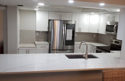 South Island Condo | Sandy, white beaches right outside your door! Relax and let the good times roll!