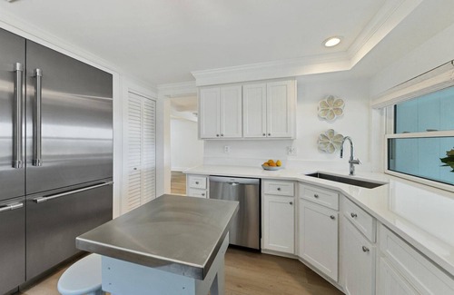 Cherokee Park House | Sarasota Renovated Waterfront Home with Dock Wide Open Bay Views Heated Pool