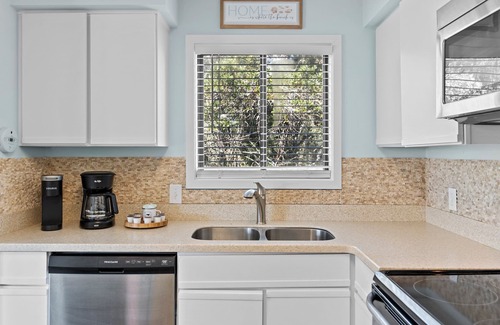 Caswell Beach Condo | Scenic Caswell Beach! 3 Mins to Beach & Pool. Clean + Conveniently Located