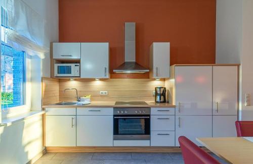 Muritz Apartment | Schwan - Ferienwohnung am Loppiner See mit Terrasse und Sauna