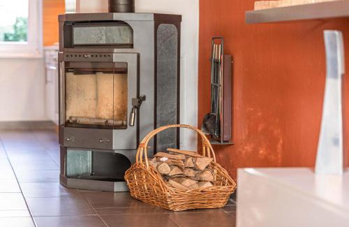 Muritz Apartment | Schwan - Ferienwohnung am Loppiner See mit Terrasse und Sauna