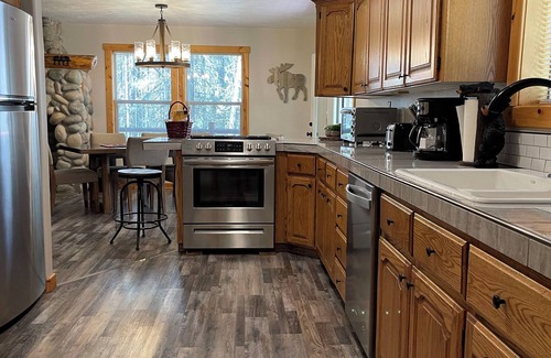 Island Park Cabin | Scruffy Bear Lodge on Bills Island near Yellowstone-Lake access/pines/ATV trails