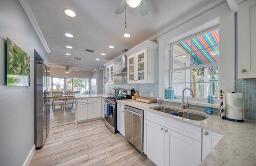 Carlouel House | 'Sea Breeze' - Beautiful Clearwater Beach Home - Heated Pool, Spa & Grill