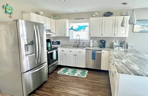 Port St. Joe House | "Sea-duced" Gulf Front! Private Boardwalk!Screen Porch! Firepit!Beach Equipment!