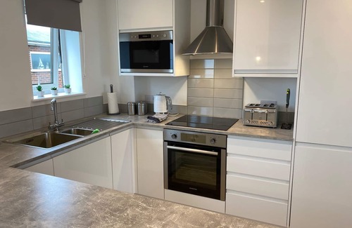 Hunstanton House | Sea-side holiday home with balcony views to the sea