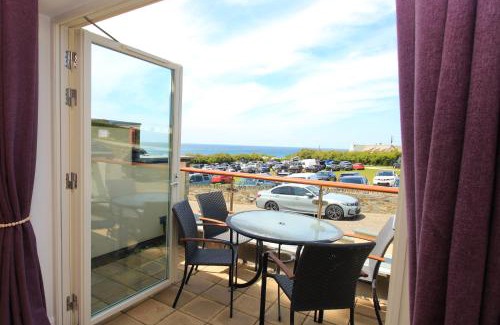 Treyarnon Apartment | SEA VIEWS, beachside apartment with balcony