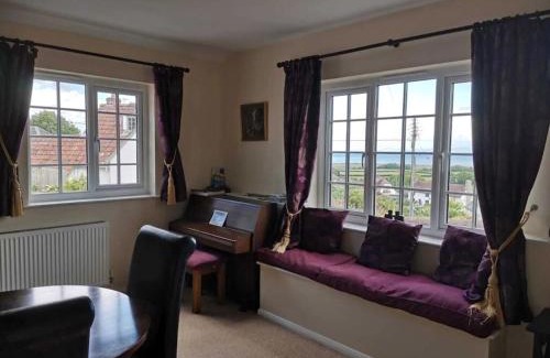 Porlock House | Sea views, private garden, comfortable family and dog friendly home