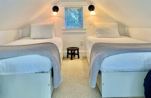 Seabrook House | Seabrook's Slack Tide, a cozy loft style cabin in Beach Camp!