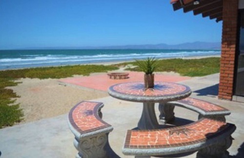 Lengueta Arenosa House | Searenity Keep an eye on kids. You: on patio with a refreshing beverage.