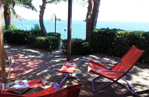 Porto Azzurro Apartment | Seaside apartment 50 meters from the beach with private pine forest