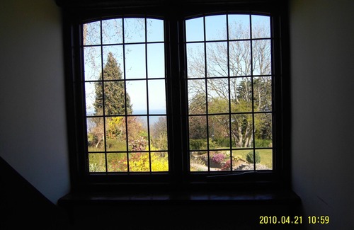 Colwyn Bay House | Seaview from bedroom, lounge and bathroom within an acre garden of tennis court