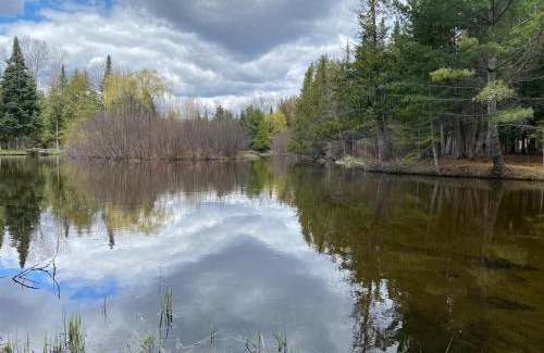 Grayling House | Secluded Au Sable River Home