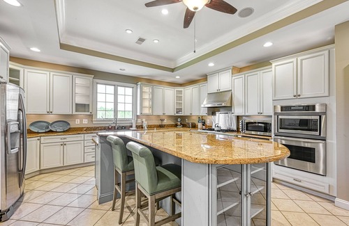 Sunrise Bay House | Secluded lakefront home with elevator, dock, private saltwater pool & hot tub