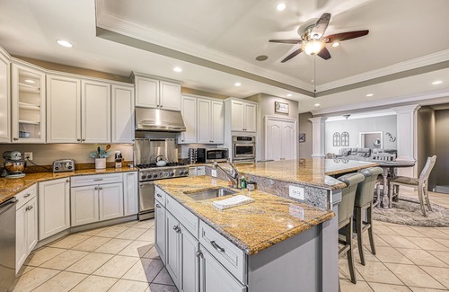 Sunrise Bay House | Secluded lakefront home with elevator, dock, private saltwater pool & hot tub