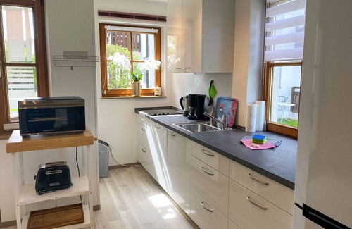 Arlaching Apartment | Seerose, 46sqm, 2 bedrooms, balcony and garden view