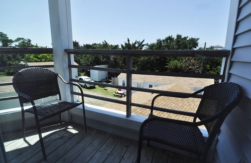 Ocracoke Condo | Selah By The Sea : Relax on the covered deck and enjoy the breezes