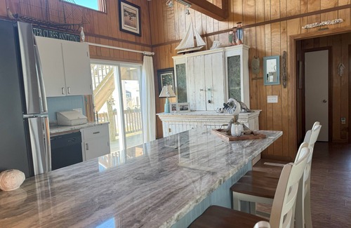 South Nags Head Cottage | SEMI-OCEANFRONT 70 Steps to Beach! 3 Decks/Ocean Views. Delightful Family Fun!