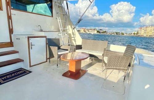 Key West Boat Rental | Sentient Waters: 63' Boat With Full Amenities & Sun Deck