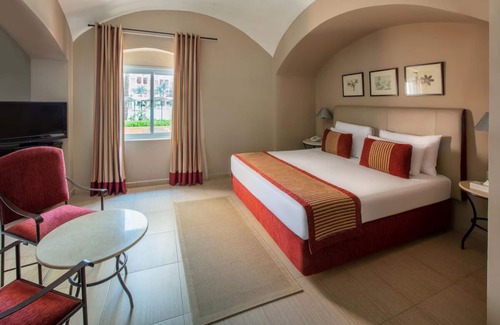 Makadi Bay Resort | Serene Escape: Enjoy Plush Room Near Makadi Water World Aqua Park