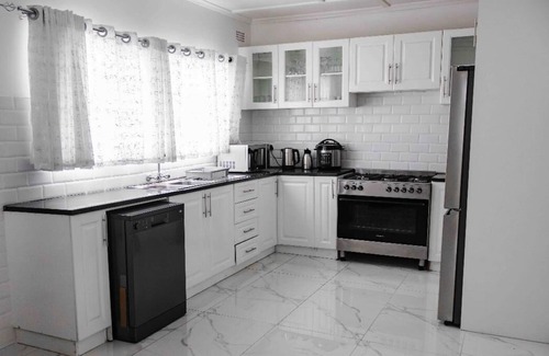 Bulawayo House | Serene four bedroom family home within walking distance of local amenities.