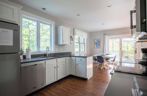 Kennebunkport Condo | Serene home near Goose Rocks Beach. Bubbling brook, bikes & beach gear