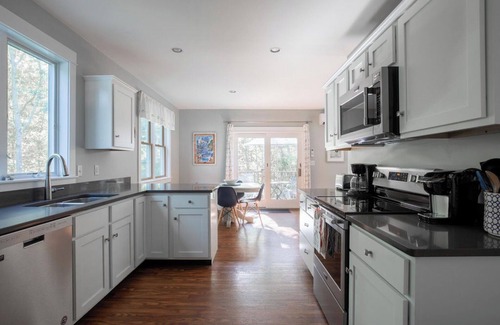 Kennebunkport Condo | Serene home near Goose Rocks Beach. Bubbling brook, bikes & beach gear