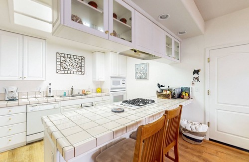 Bass Lake House | Serene river & mountain view retreat with hot tub, pool, AC, & patio