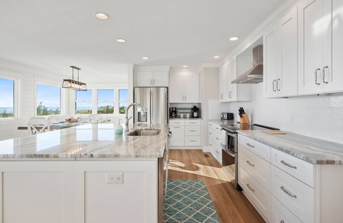 Caswell Beach House | Serenity by the Sea: Nostalgic Oceanfront Home with Room for the Whole Family