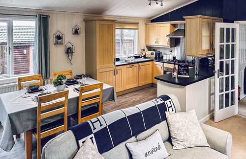 Mullacott Cottage | Set on the quiet Mullacott Park, this wonderful lodge is a perfect escape with plenty to do nearby.
