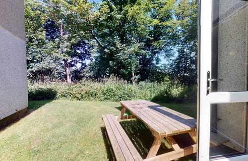 Saint Erth Praze Apartment | Set within the grounds of Tolroy Manor, Strawberry Cottage enjoys use of shared facilities