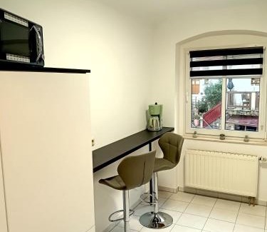 Niederrathen Apartment | Seyfarthrooms - Ferienwohnung Zum Dorfladen Rathen - zentrale Lage mit direkter Anbindung an das Wanderwegenetz, moderne Inneneinrichtung