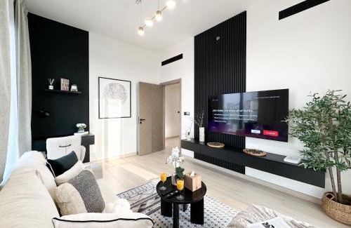 Jumeirah Village Circle Apartment | Shadow Lounge Suites Work Station & Dubai Skyline Views