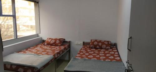 Vadodara Bed & Breakfast | Shiv Sai Dormitory
