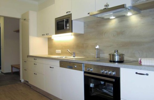 Weissenbach House | Siedlerhof by Interhome