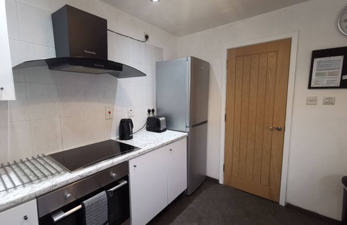 Aviemore House | Silver Trees - holiday home with hot tub in lovely garden - child/pet friendly