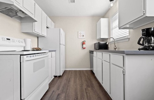 Central Arlington Apartment | Six Flags suite professionally cleaned with luxe king bed