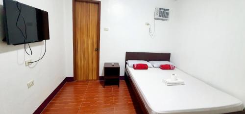 Mambajao House | SJ Pabua Travellers Inn