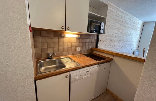 Lanslevillard Apartment | Ski-In/Ski-Out Apartment for 4 with Balcony and Parking in Val Cenis