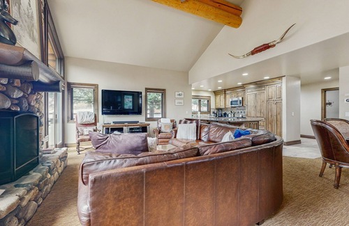 Warm Springs House | Ski-in/ski-out chalet with fireplace, furnished deck, & alfresco dining