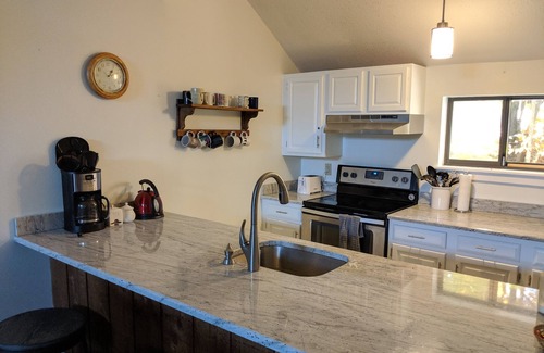 Ludlow House | Ski on, ski off four bedroom trailside condo at Okemo