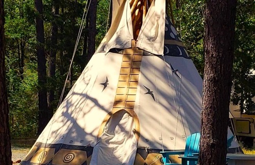 Cave Junction Apartment | Sky Spirit -Luxury Glamping 18' Tipi - Restrooms and Showers are only a short walk away.