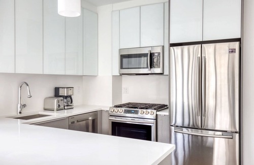 Hunters Point Apartment | Sleek LIC 1BR w/Gym, Doorman, Elevator & Private Balcony, by Blueground