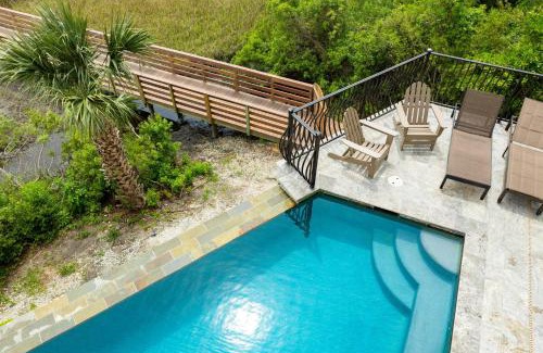 Palmetto Dunes House | Sleeps 24 Private Beach Boardwalk Infinity Pool 20 Bradley Cir by AvantStay