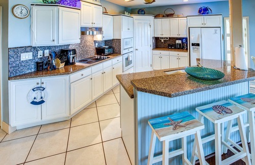 Eden Pines House | Slice of Paradise: Captivating Open Water Views, Deep Canal, Dockage, Heated Pool, and Pet-Friendly!
