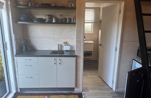 North Taranaki District Apartment | Small studio situated close to North Taranaki’s most beautiful beaches.