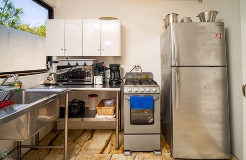 Punta Cancun House | Small suite with warmth