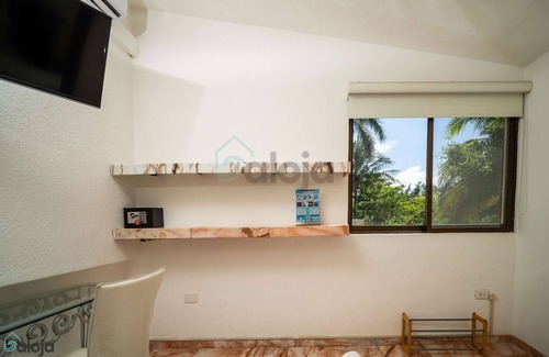 Punta Cancun House | Small suite with warmth