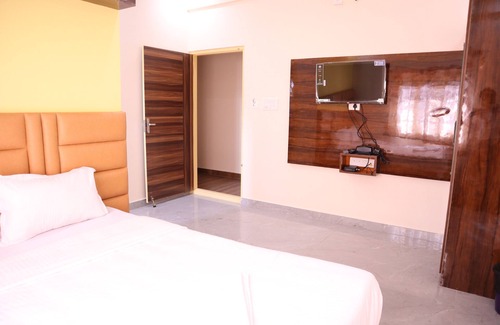 RR Nagar Hotel | Smilestay Karanji Paradise