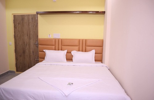 RR Nagar Hotel | Smilestay Karanji Paradise